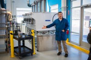 Jim Kenney showing freshly plated nickel at the lithium AquaRefining Pilot
